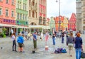 Street entertainer Ã¢â¬â playing with children, making soap bubbles